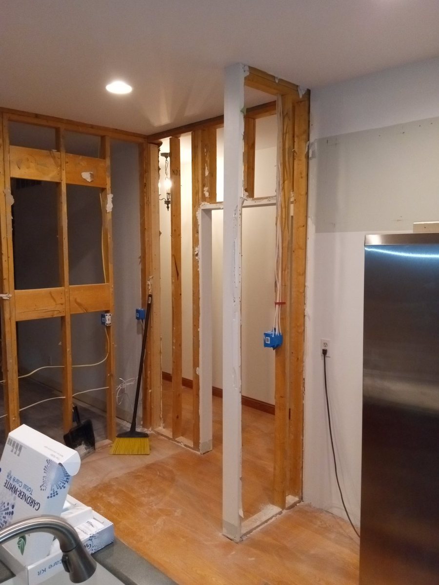 Interior door and trim openings ready for completion.