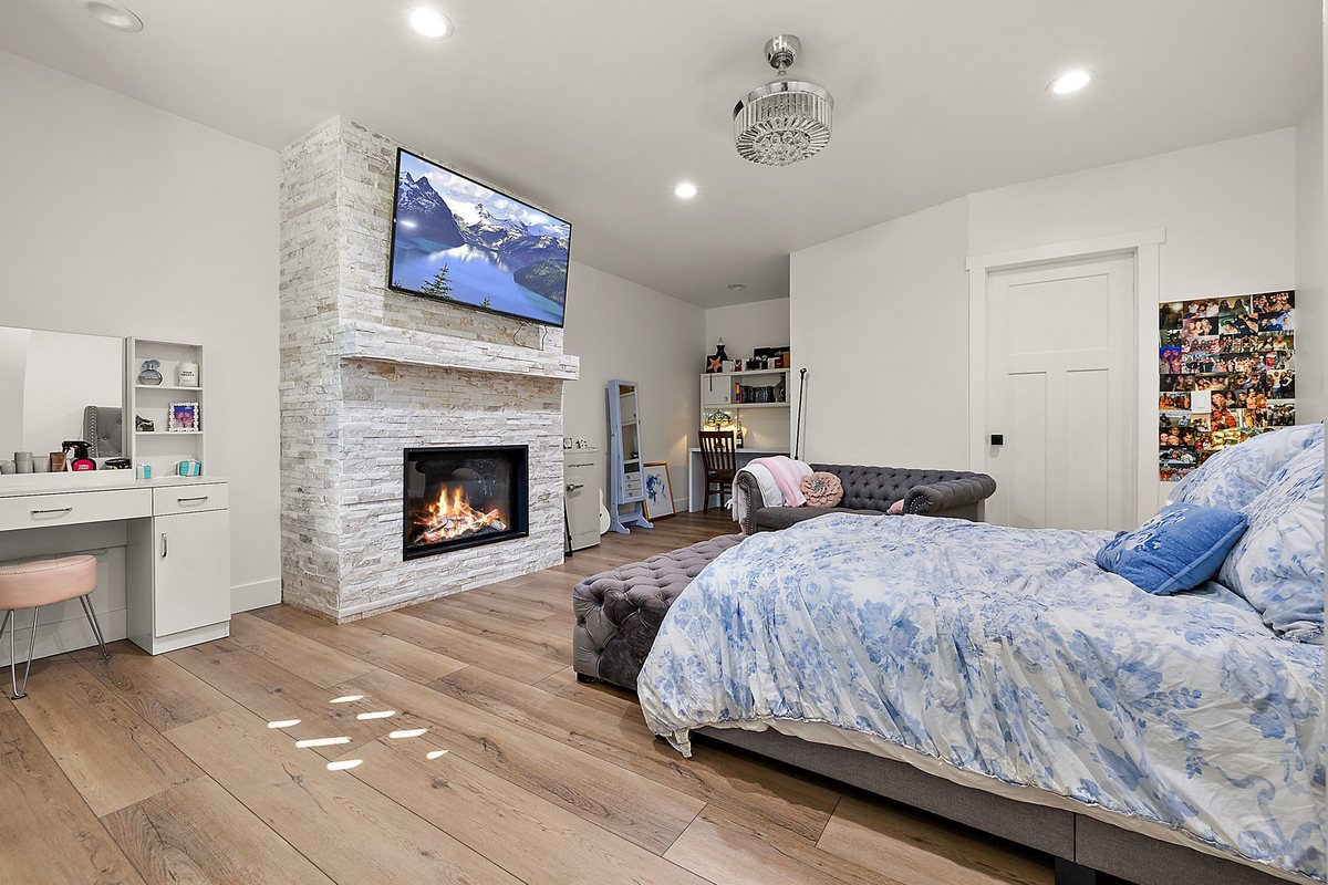 Finished bedroom with clean walls and flooring.
